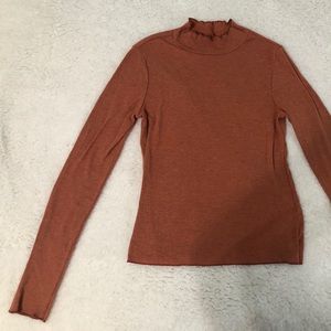 Orange long sleeve shirt
